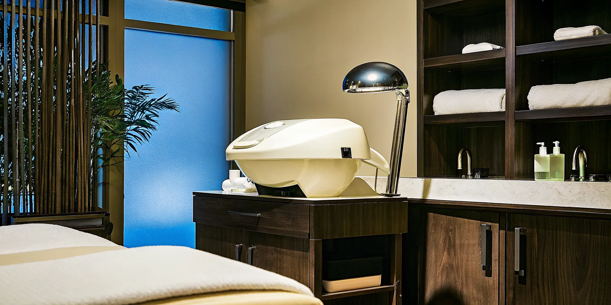 Professional head spa treatment room with Halo water therapy equipment and scalp steamer at The Sage HeadSpa
